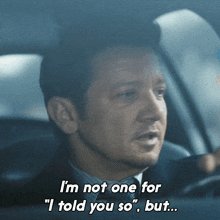The image shows a man sitting inside a car, looking at someone who has written a message for him. The text reads "I'm not one for... I told you so." This message seems to be related to the movie "Dark Knight" as there is an image of the character Kevin Costner in the scene where he says this line. The post also mentions ISO20022, which is an international standard for payments and settlement between banks, institutions, and blockchains. This standard is crucial for the integration of TradFi with DeFi technology.
