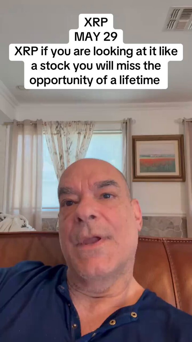 The image features a man sitting on a couch with his head resting against the backrest, appearing to be tired or sleepy. The background of the image shows a window that allows natural light into the room. There are two posts visible in the image - one is directly above the man's head and the other is located below it. These posts contain text related to cryptocurrency, specifically XRP (XRP), which may suggest that the man has been discussing or researching about XRP with others online. The post also mentions a potential opportunity for investing in XRP as an asset, possibly indicating that the man might be considering this investment strategy.