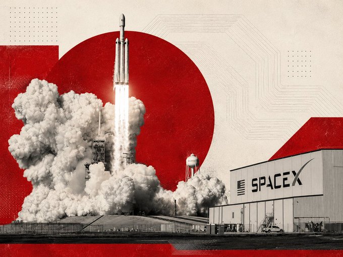 The image features a rocket launch with smoke coming out of its nose, indicating that it's about to take off into space. The rocket can be seen in the top left corner of the image, while the words "SpaceX" are written on the bottom right corner. In the background, there is a building or factory-like structure, possibly related to the space industry.