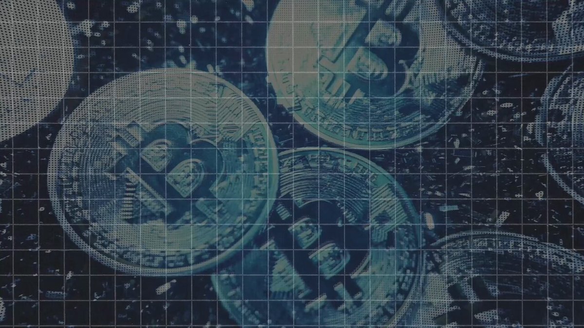 The image shows several Bitcoins scattered across a grid-like pattern with varying shades of blue. The Bitcoin coins are positioned at different angles and heights within the grid, creating an abstract representation of the cryptocurrency. The text "Bitcoin failed as cash. So why are institutions buying it?" is present in the image, suggesting that there might be some discussion or analysis about the current state of Bitcoin's value or its relevance to institutional investors.