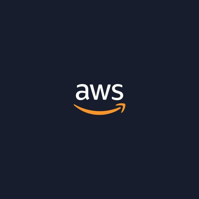 The image features the AWS (Amazon Web Services) logo centered on a dark navy background, with the lowercase "aws" text in white above the signature orange smile arrow. This logo represents the Amazon cloud computing division mentioned in the post about its upcoming 15% price increase on reserved GPU instances.