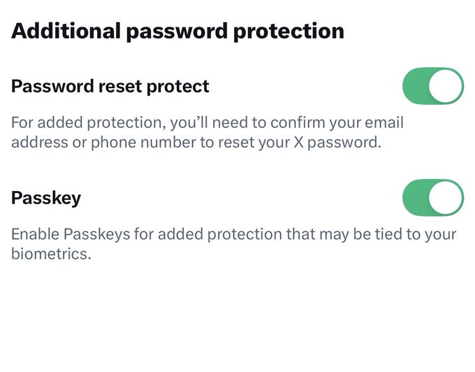 A settings screen showing "Additional password protection" options on X, with both "Password reset protect" and "Passkey" toggles turned on, illustrating the security features the post recommends enabling for extra account protection.