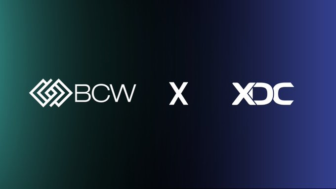 The image features a logo for a company called XDC Network that has recently joined forces with another company, BCW. The logos are displayed against a blue background, creating an eye-catching contrast. The text below the logos reads "We have officially joined the @XDCNetwork validator ecosystem. We're now bringing enterprise-grade uptime and staking expertise to secure the L1 network". This message highlights the collaboration between these two companies in the context of their joint efforts to improve the infrastructure for RWA tokenisation, cross-border payments, and global transactions.