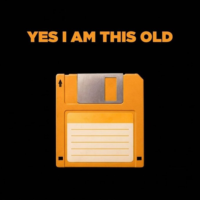 A vintage orange 3.5-inch floppy disk is shown against a black background, with the bold orange text "YES I AM THIS OLD" displayed above it. The image relates to the nostalgic caption by evoking early 1990s computing technology, reminding older generations of a time when floppy disks were the standard means of storing and transferring data.