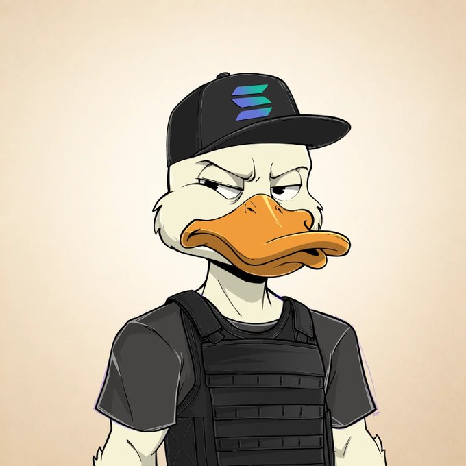 An illustrated cartoon duck character wearing a black cap featuring a blue and purple logo, displaying a stern expression, along with a black tactical vest over a black shirt.