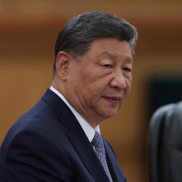 This image shows Xi Jinping, the leader of China, whose government recently purchased $3.1 billion of gold, adding 740,000 ounces in September.