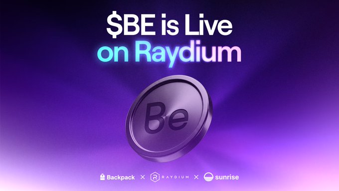The image features a promotional graphic announcing "$BE is Live on Raydium" with a stylized 3D "Be" coin emblem centered against a purple and blue gradient background. Partner logos for Backpack, Raydium, and Sunrise are displayed at the bottom, visually reinforcing the announcement of Bloom Energy's tokenized stock ($BE) launching for 24/7 trading on Solana.