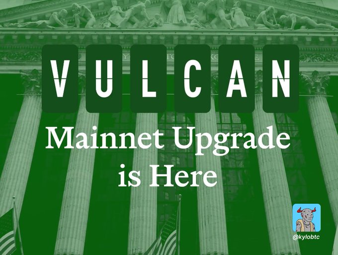 The image features a green building with columns and a dome, which serves as an advertisement for the "Vulcan Mainnet Upgrade" that has been officially launched. The text above the image reads "Vulcan Mainnet Upgrade is here", indicating that the upgrade is now live and accessible to users. The post also mentions that the update includes Stablecoins, RWA's, lower fees, and a focus on reducing attention from the numbers $INJ.