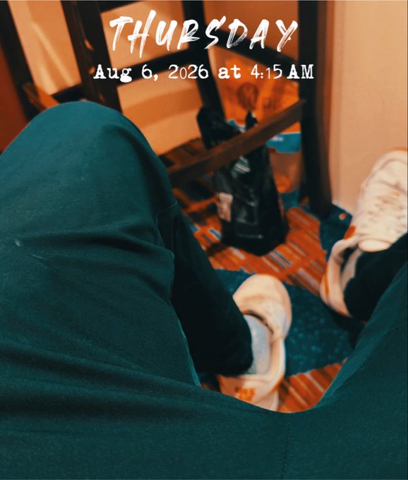 The image shows a first-person view of someone in dark pants and white sneakers sitting on a chair with orange-toned walls in the background, overlaid with the text "THURSDAY Aug 6, 2026 at 4:15 AM." This pairs with the "Who locked in early today ready to make gains?" caption to suggest the person is up before dawn grinding early in the morning.