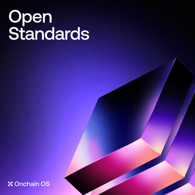 The image features a 3D rendering of a purple square with a pink border, which appears to be a block or cube shape. The background color of the image is blue. Below this image, there is text that reads "Open Standards".