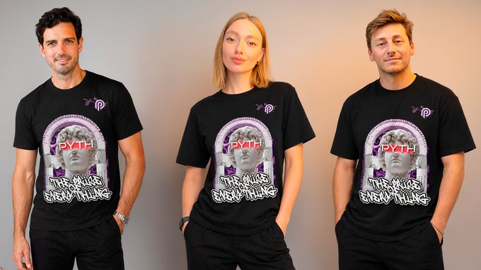 Three people wearing matching black t-shirts featuring a Psy-themed graphic with 'P.Y.H' and 'THE KILLER IS EVERYTHING' text stand together posing.