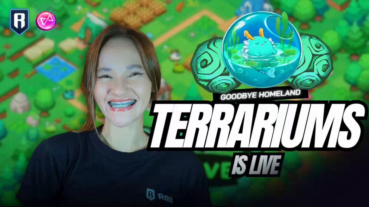 The image features a woman with a big smile, wearing a black t-shirt that says "TERRARIUMS IS LIVEEEEE" (terrariums is live). The text above her reads "GOODBYE HOMELAND", which suggests she is talking about the game Terrariums. The background of the image shows a green landscape with trees and buildings, indicating it's an outdoor setting. There are also two other people in the image who appear to be part of the conversation or scene.