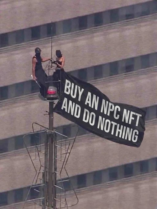 Two people stand atop a tall antenna or broadcast tower, unfurling a large black banner that reads "BUY AN NPC NFT AND DO NOTHING," mocking speculative crypto culture. The image ties into the post's ironic "bullish" tone by humorously encouraging followers to join the NPC chain project—a play on passive, NPC-like crypto investors who simply buy and do nothing.