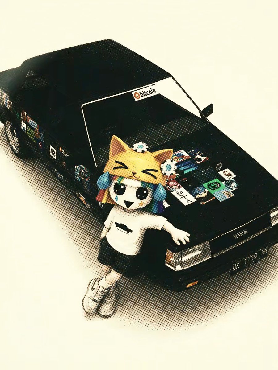An artistic photo composition features an anime-style figure with cat ears standing in front of a black Toyota car covered in stickers, including a 'bitcoin' sticker on the windshield.