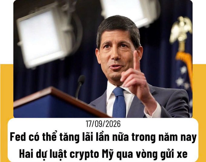 News thumbnail dated 17/09/2026 showing a man speaking at a podium, with Vietnamese headlines about the Fed potentially raising rates again this year and two US crypto bills passing the first reading.