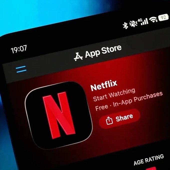 A smartphone screen showing the Netflix app page in the App Store with 'Start Watching' and 'Free · In-App Purchases' visible.
