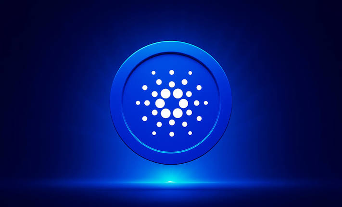 Cardano (ADA) cryptocurrency logo displayed as a blue circular emblem with the characteristic dot pattern on a glowing blue background.
