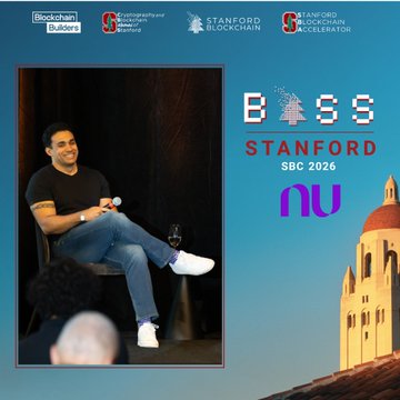 A man sits on stage at the Stanford Blockchain Conference 2026, with the event branding "The BASS STANFORD SBC 2026" and nu logo displayed alongside promotional text about retail adoption and bringing millions of users onchain.