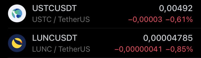 Cryptocurrency price ticker display showing USTC/USDT at 0.00492 (-0.61%) and LUNC/USDT at 0.00004785 (-0.85%) against USDT.