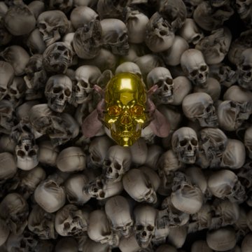 A golden skull ornament surrounded by a pile of gray human skulls.