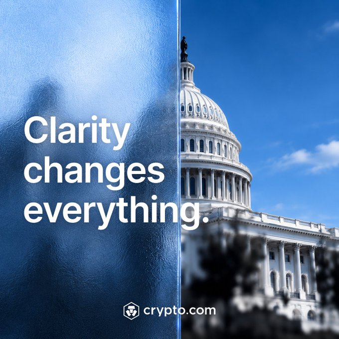 A promotional image for crypto.com featuring a frosted glass panel displaying "Clarity changes everything." alongside the U.S. Capitol building, visually reinforcing the post's call for input on how regulatory clarity could benefit crypto builders, traders, and users in the United States.
