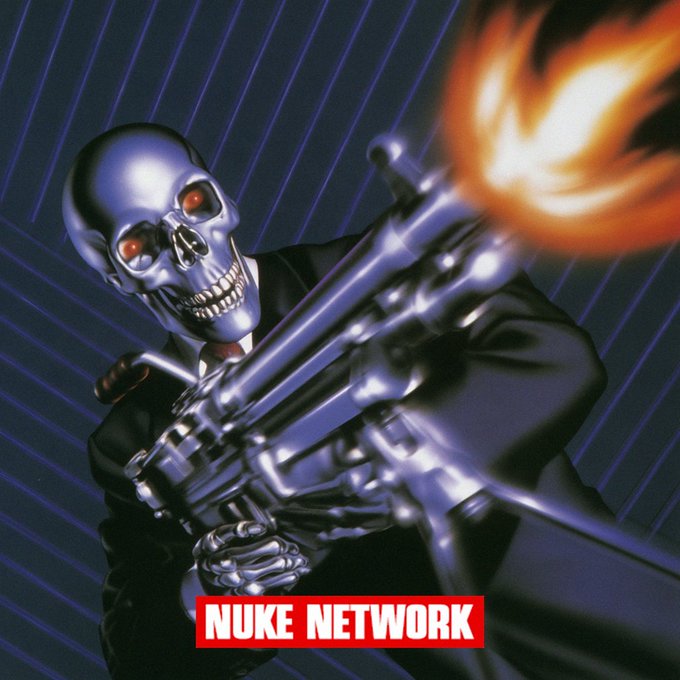 A retro-style digital illustration of a chrome metallic skull in a business suit wielding a large futuristic gun with flames, labeled 'NUKE NETWORK' at the bottom.