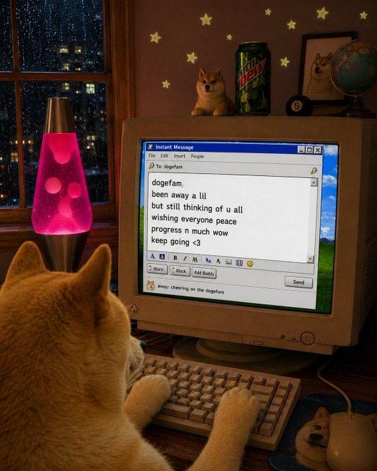 urn of lava lamp, computer monitor displaying "DOGGFAAN" message, and a cat on the desk.
