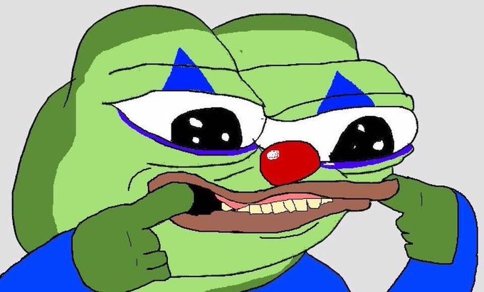 A crudely drawn cartoon frog with sad, watery eyes, blue triangle markings, and an open mouth showing teeth, set against a gray background. The image appears to be a poorly drawn digital illustration resembling the "sad Pepe the Frog" meme.