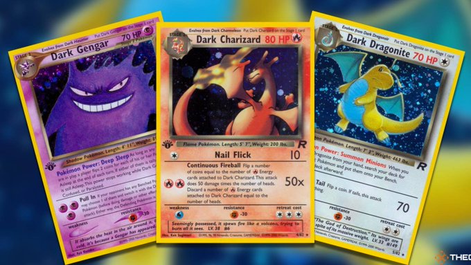 Three Pokemon trading cards displayed together: Dark Gengar (70 HP), Dark Charizard (80 HP), and Dark Dragonite (70 HP), all evolved from Dark Pokemon.