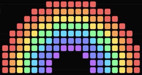 A colorful, semi-circular mosaic made of square tiles in a rainbow gradient pattern against a black background.