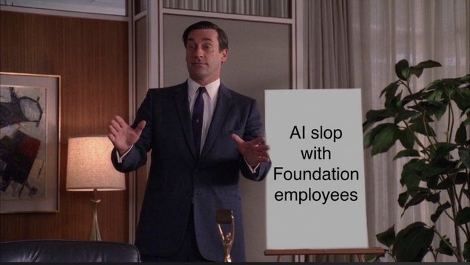 The image shows a man in a suit gesturing with his hands while standing in an office setting next to an easel displaying the text "AI slop with Foundation employees." The meme humorously visualizes the post's announcement that they're shifting from videos featuring real Foundation employees to AI-generated content ("slop") about the Solana ecosystem, using the businessman's exaggerated presentation pose to mock the transition.
