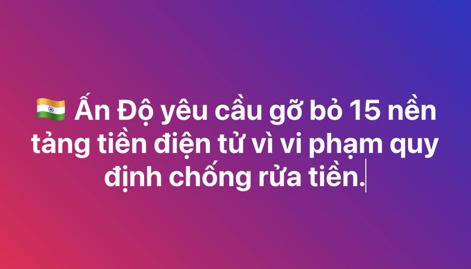 A text graphic on a pink and purple gradient background featuring the Indian flag emoji followed by Vietnamese text: 'Ấn Độ yêu cầu gỡ bỏ 15 nền tảng tiền điện tử vì vi phạm quy định chống rửa tiền.' (India demands removal of 15 cryptocurrency platforms for violating anti-money laundering regulations).