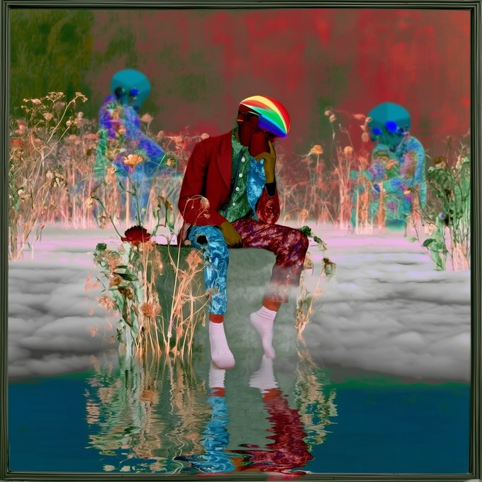 A surreal digital artwork depicts a figure wearing a rainbow-patterned helmet, red blazer, and patterned pants sitting on a stone in a misty landscape with blue humanoid figures in the background, with a reflection in water below.