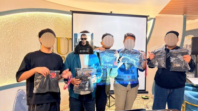 Several people pose together holding packaged uniform items in clear plastic bags, with one bag displaying the "Meteora" logo, reflecting the post's gratitude to the Meteora community for providing them with official gear after attending a meetup.