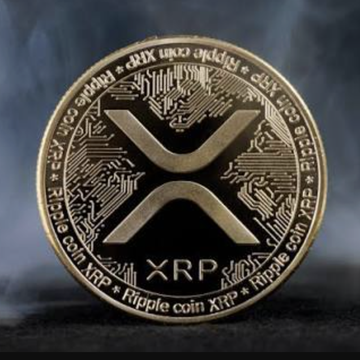 A close-up of a gold XRP cryptocurrency coin, featuring the XRP ticker and Ripple coin branding. It symbolizes the on-chain institutional finance and Nasdaq-listing strategy discussed in the post about Evernorth and Armada.