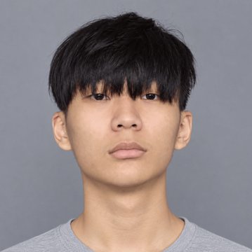 A professional headshot of a young East Asian man with black hair and a neutral expression, wearing a light gray t-shirt against a plain gray background.
