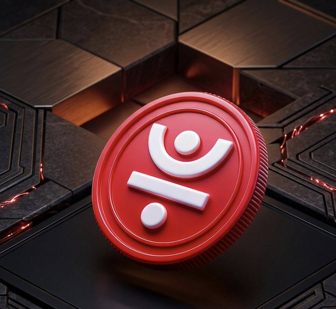 A bold red coin bearing the stylized "JUST" symbol rests on a sleek, dark hexagonal platform with subtle red glowing accents. The token's striking design reinforces the post's message of non-custodial asset protection, symbolizing personal financial sovereignty through decentralized technology.