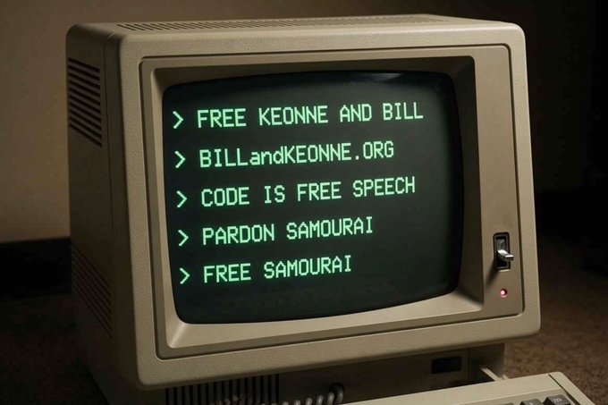 A vintage computer monitor displays green text reading '> FREE KEONNE AND BILL, > BILLandKEONNE.ORG, > CODE IS FREE SPEECH, > PARDON SAMOURAI, > FREE SAMOURAI.'
