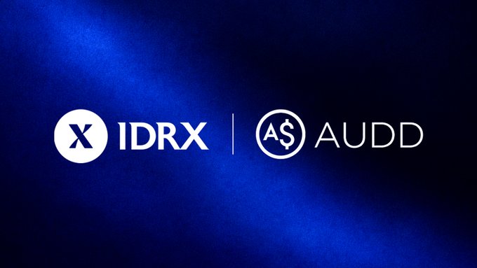 A blue promotional graphic displaying "IDRX | AUDD" with a circled "X" logo and an "A$" currency symbol.
