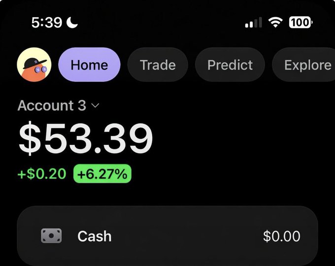 A mobile app screenshot showing Account 3 with a balance of $53.39, up $0.20 (+6.27%), with navigation tabs for Home, Trade, Predict, and Explore.