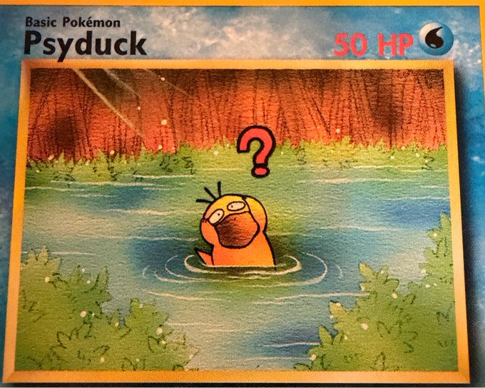 A custom Pokémon-style card featuring Psyduck with 50 HP, depicting the confused duck emerging from water with a question mark above its head. The caption humorously suggests using this iconic, perpetually confused Psyduck as a profile picture for a memorable final online appearance.