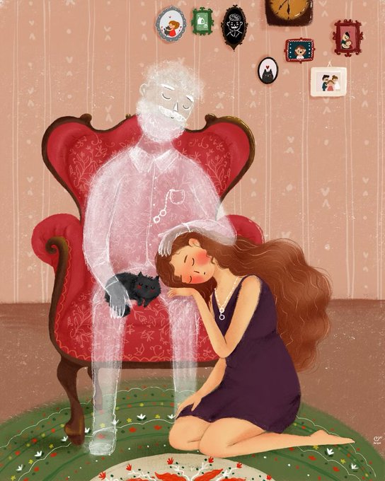 The image features a woman kneeling down next to an old man who appears to be a ghost, with both of them holding a cat. The scene takes place inside a room that has a red chair and a green rug. There are also several framed pictures on the wall behind the couple.