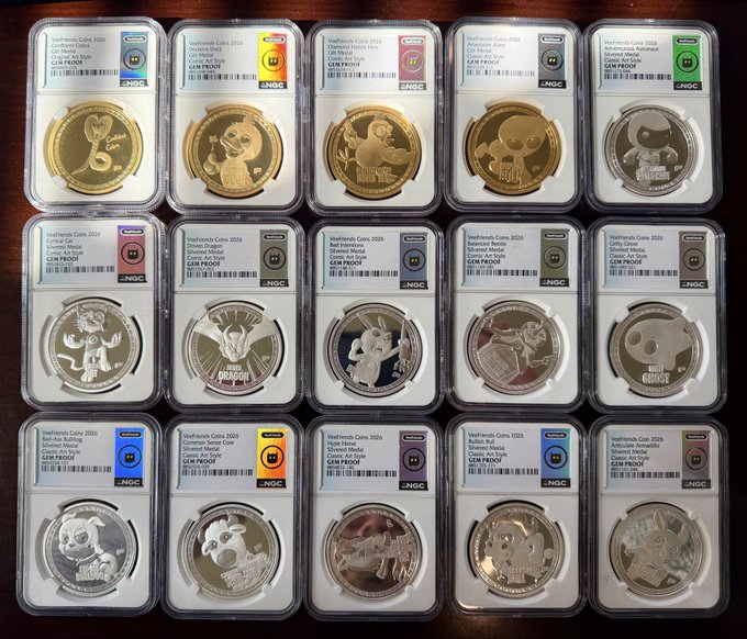 A collection of fifteen Vanfriends Coins 2026 in NGC GEM PROOF slabs is arranged in rows, featuring various animal designs including rabbits, pandas, dragons, and foxes in gold and silver finishes.