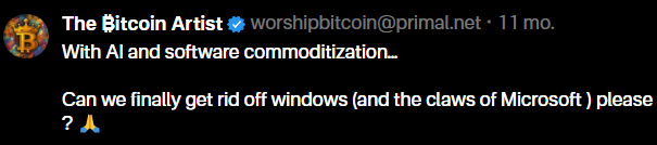 A Nostr social media post by verified user 'The Bitcoin Artist' (@worshipbitcoin@primal.net) stating: 'With AI and software commoditization... Can we finally get rid off windows (and the claws of Microsoft) please?'