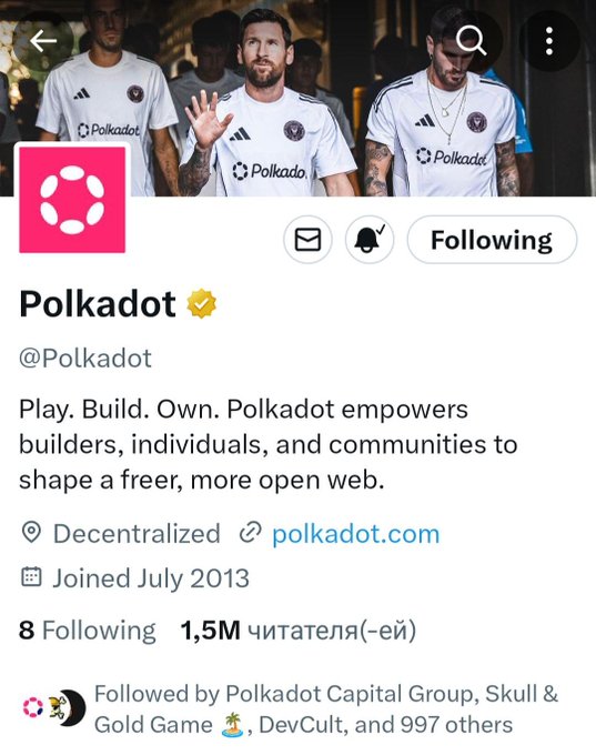 The image features a social media post from Polkadot, which is a company that focuses on blockchain technology. The post includes a photo of three men wearing Polo shirts with the words "Polkadot" written on them. The post also contains text about the company's vision and how it was launched in 2000. The image has been edited to emphasize the Polo shirt-wearing men, making them the main focus of the post.
