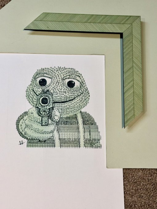 A detailed pen-and-ink illustration of a character holding a camera, created entirely from small text and lettering, displayed on white paper next to a green picture frame corner.