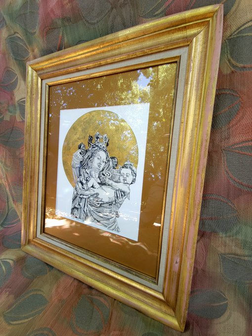 A framed pen-and-ink drawing depicting a religious scene with a crown, set against a gold background, displayed within an ornate gold frame.