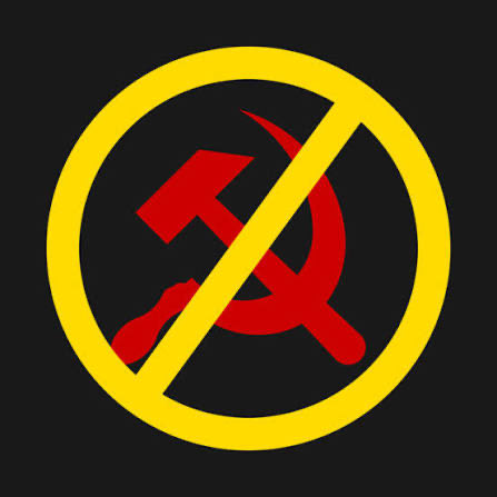 A graphic of a red hammer and sickle symbol inside a yellow circle with a diagonal slash through it, set against a black background.