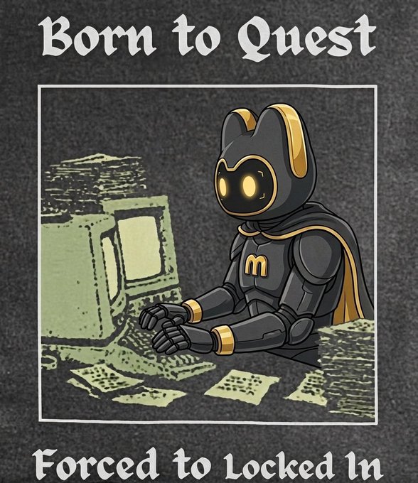 A graphic t-shirt design featuring a robot-like character with the McDonald's 'M' logo sitting at an old computer, with text reading 'Born to Quest' and 'Forced to Locked In'.
