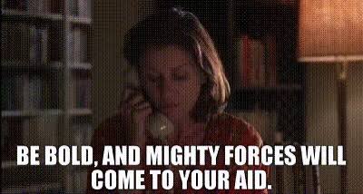 A GIF of a woman on a telephone with the caption 'BE BOLD, AND MIGHTY FORCES WILL COME TO YOUR AID.'